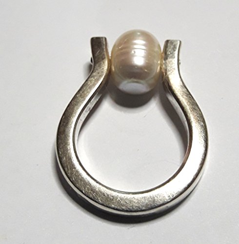 Anillo omega de plata con perla.