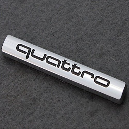 Placa cromada adhesiva con el logotipo de Quattro