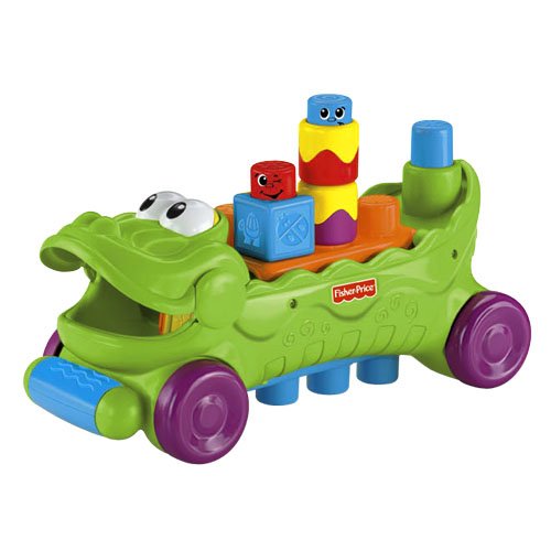 Mattel T4336 Fisher-Price - Cocodrilo musical con ruedas y piezas de apilar