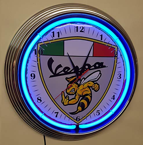 Reloj de pared iluminado con anillos de neón azules.