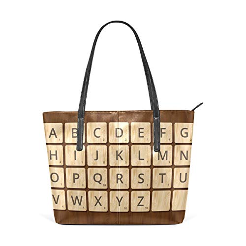 Scrabble Patrón del alfabeto en fondo de madera, bolso de mano de cuero para mujeres y niñas