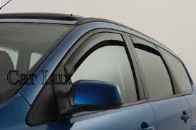 Car Lux AR04583 - Derivabrisas Deflectores de Aire Cortavientos de Viento Delanteros y Traseros para Exeo ST Desde 2009-